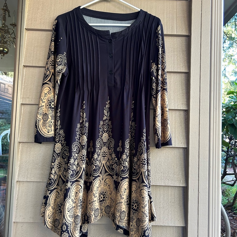 Tunic top black with ornate gold design pleated chest assymetrical hem